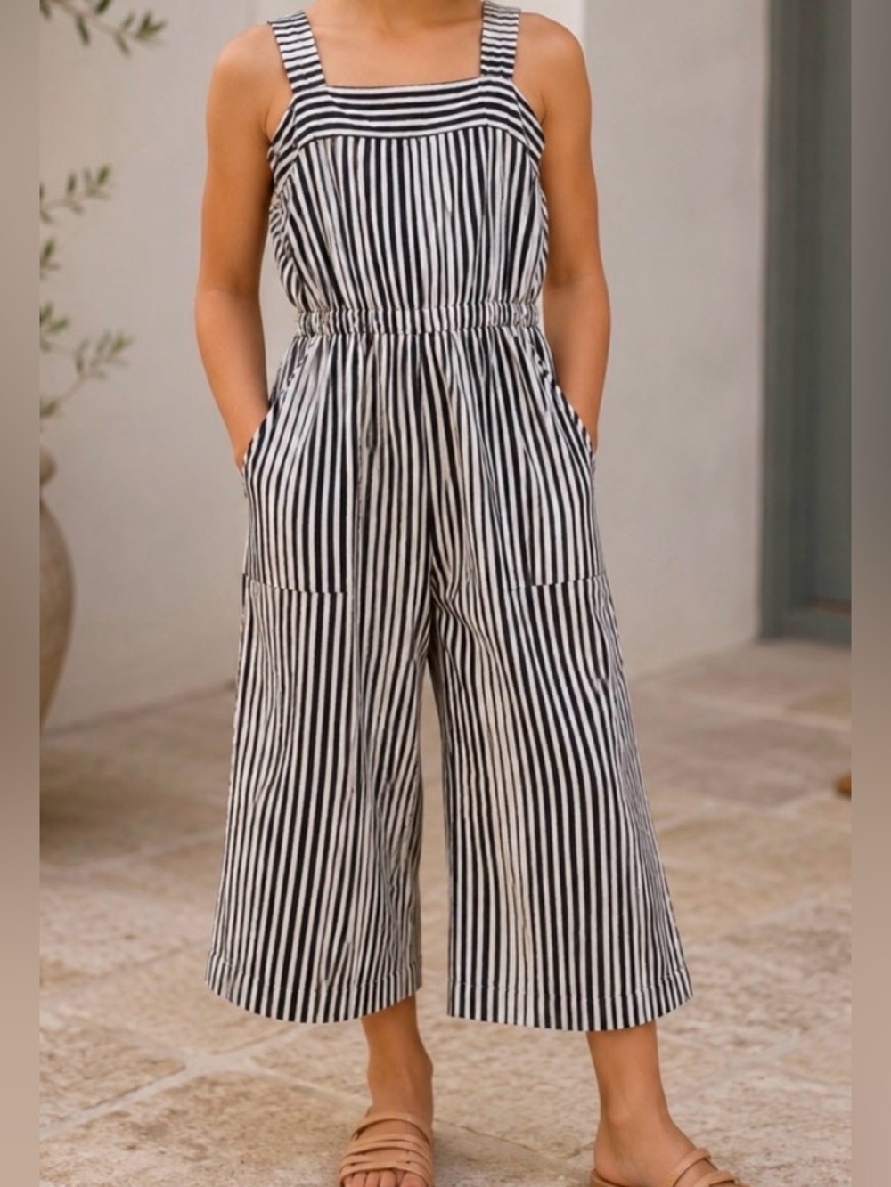Girls size 7/8 romper black and cream stripes
